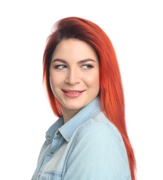 Young woman with bright dyed hair on white background