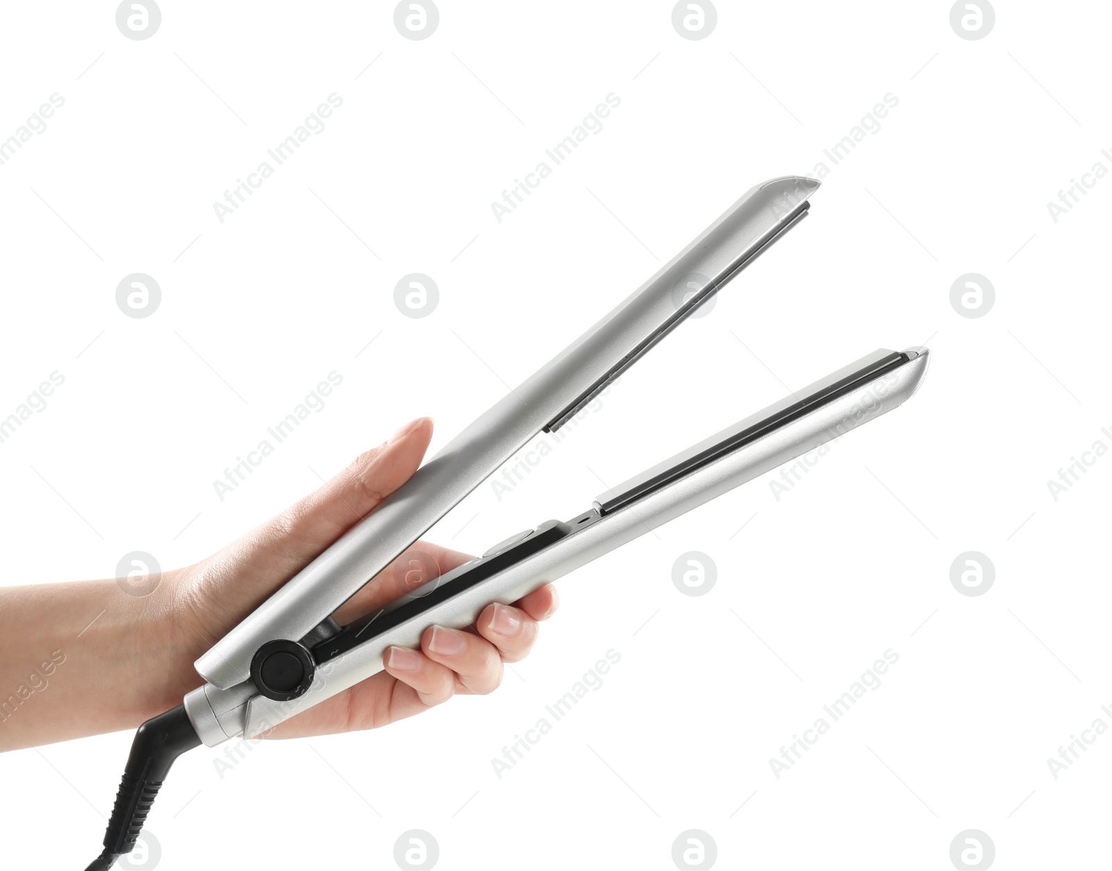 Photo of Woman holding hair iron against white background, closeup