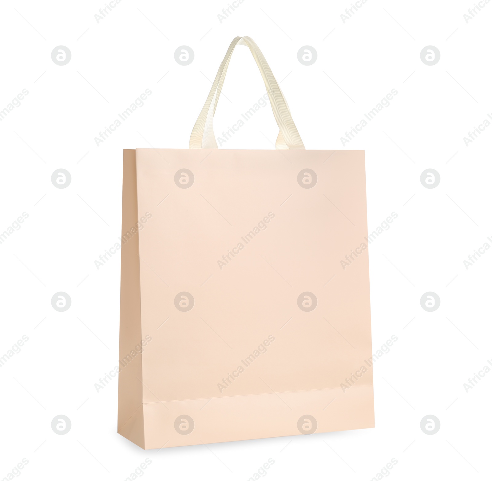 Photo of One paper bag isolated on white. Mockup for design