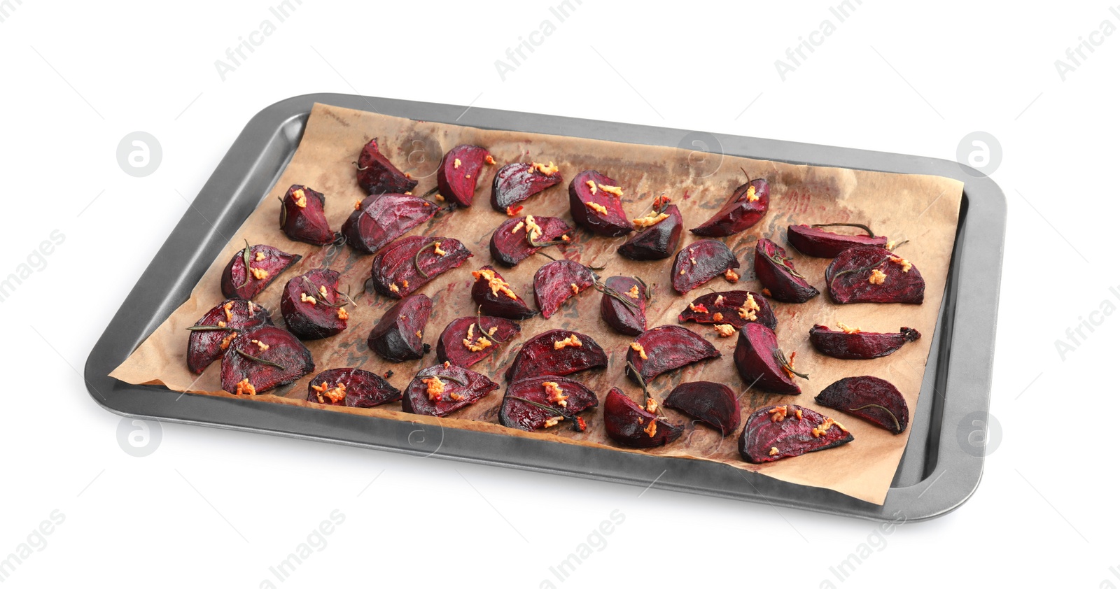 Photo of Baking tray with roasted beetroot slices on white background