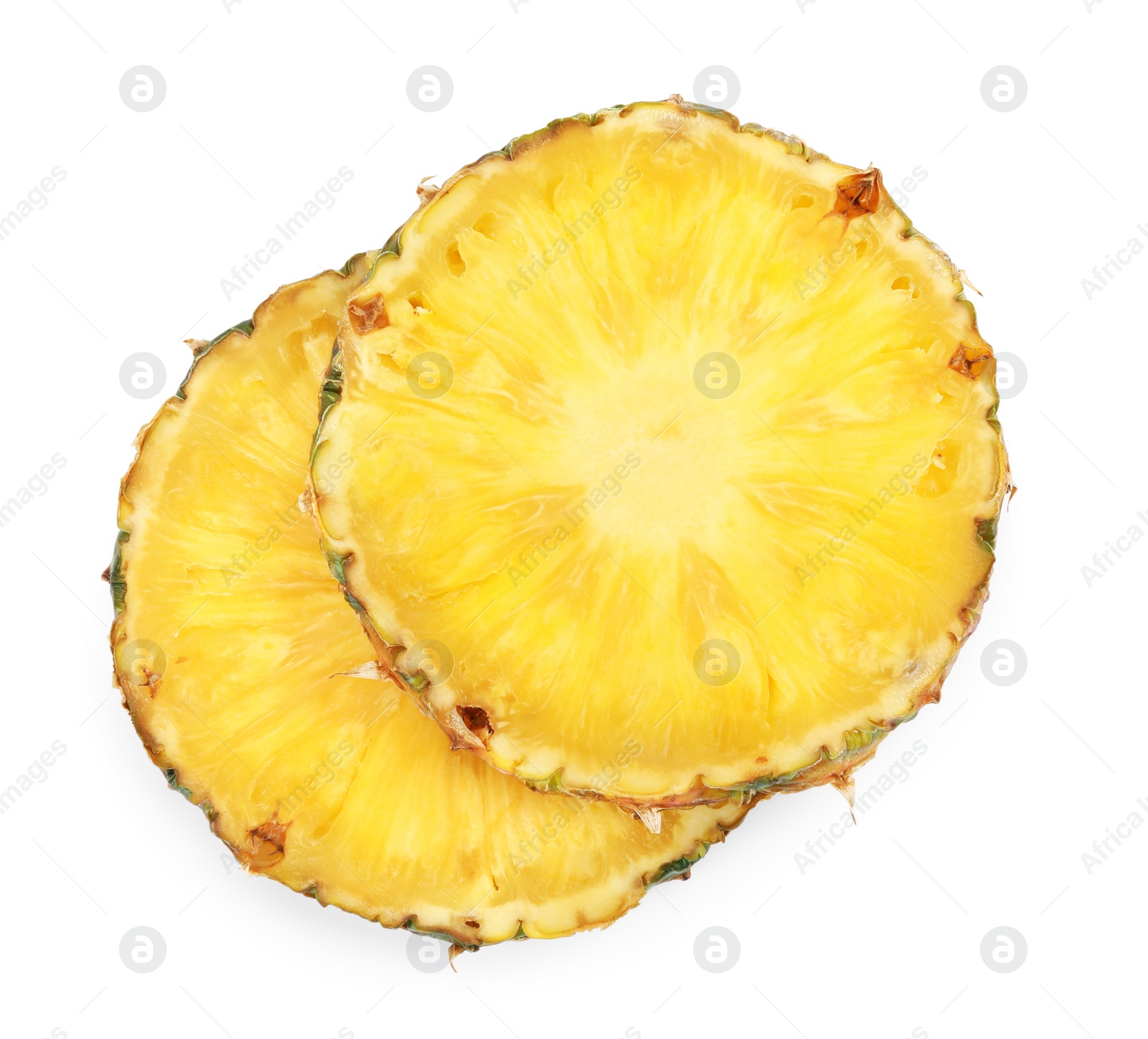 Photo of Slices of tasty ripe pineapple isolated on white, top view