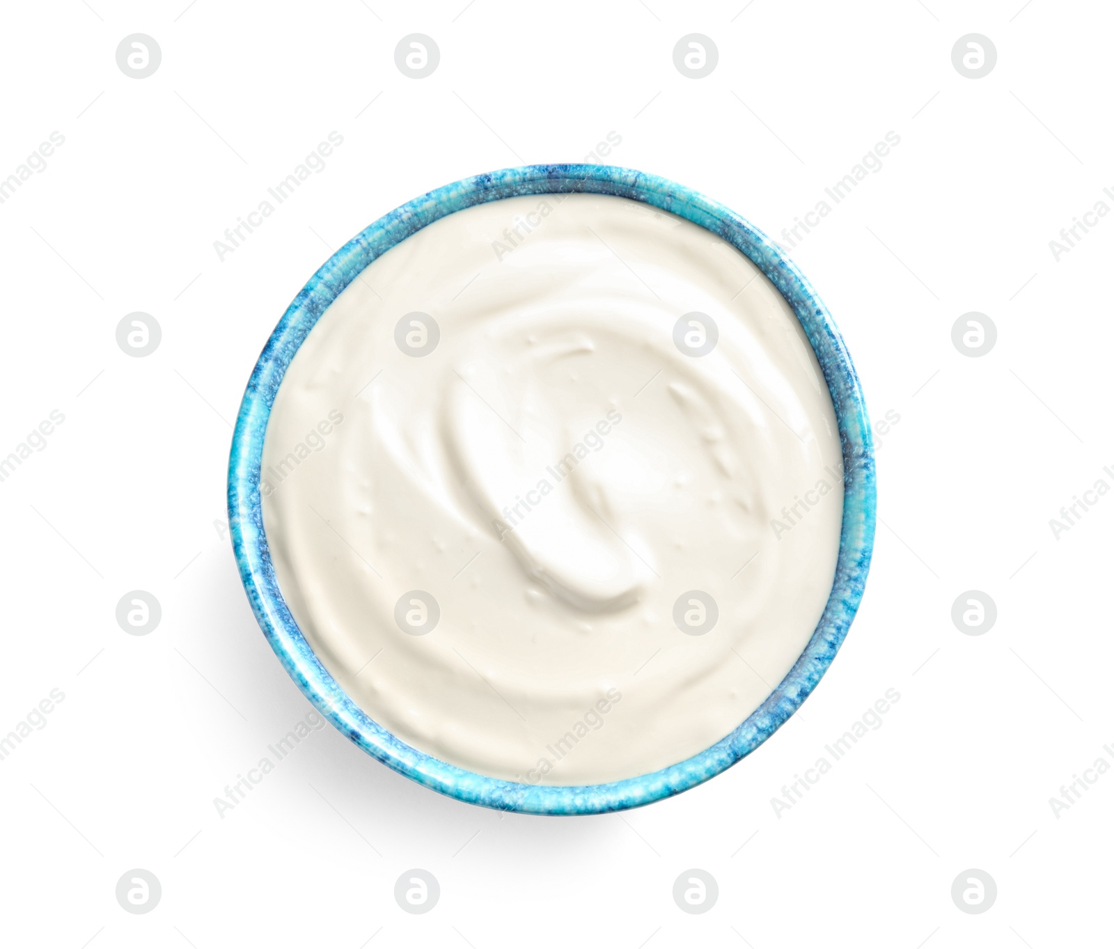 Photo of Bowl with creamy yogurt on white background, top view