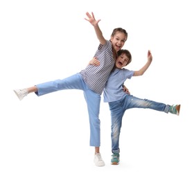 Happy brother and sister on white background