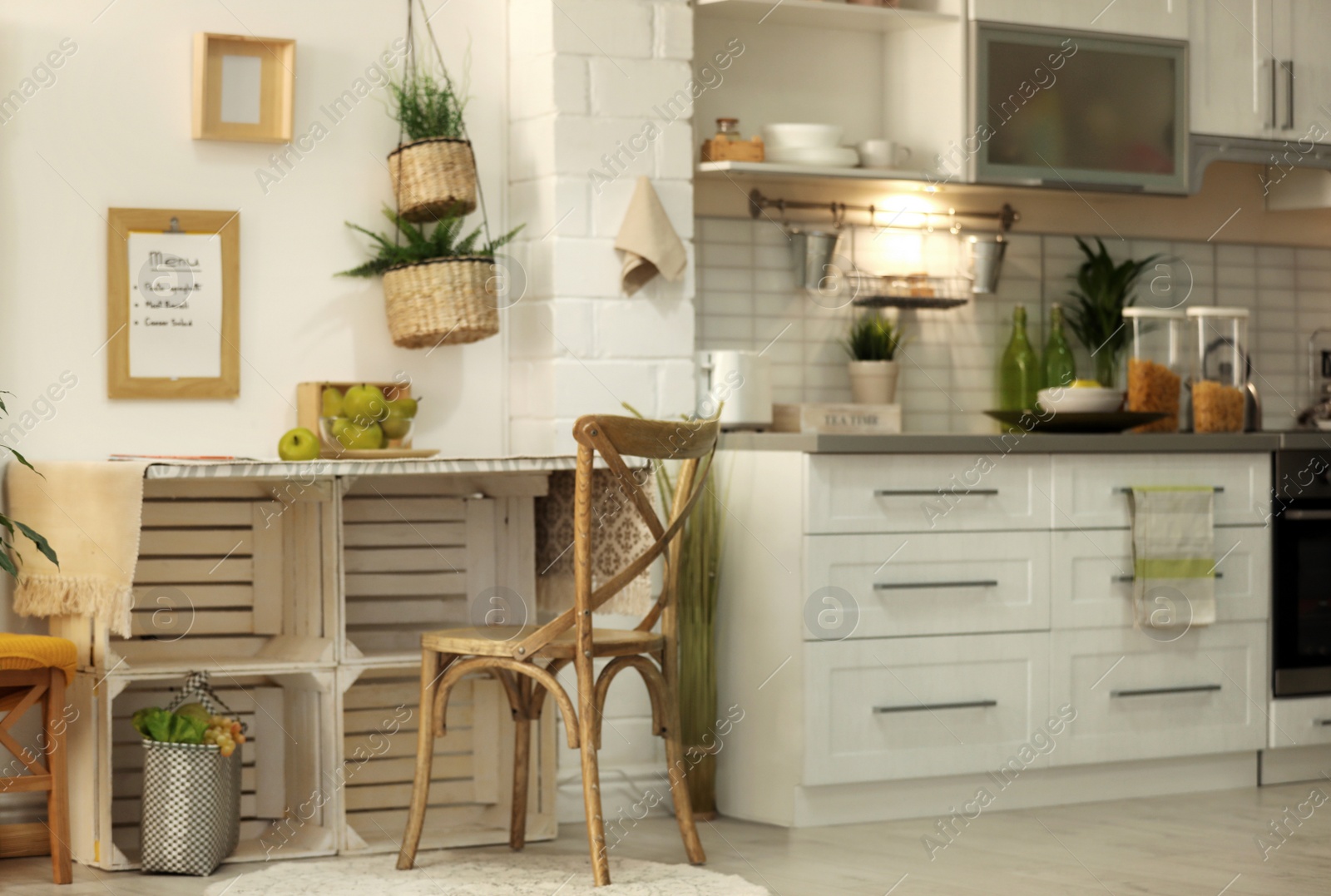 Photo of Modern kitchen interior with wooden crates as eco furniture