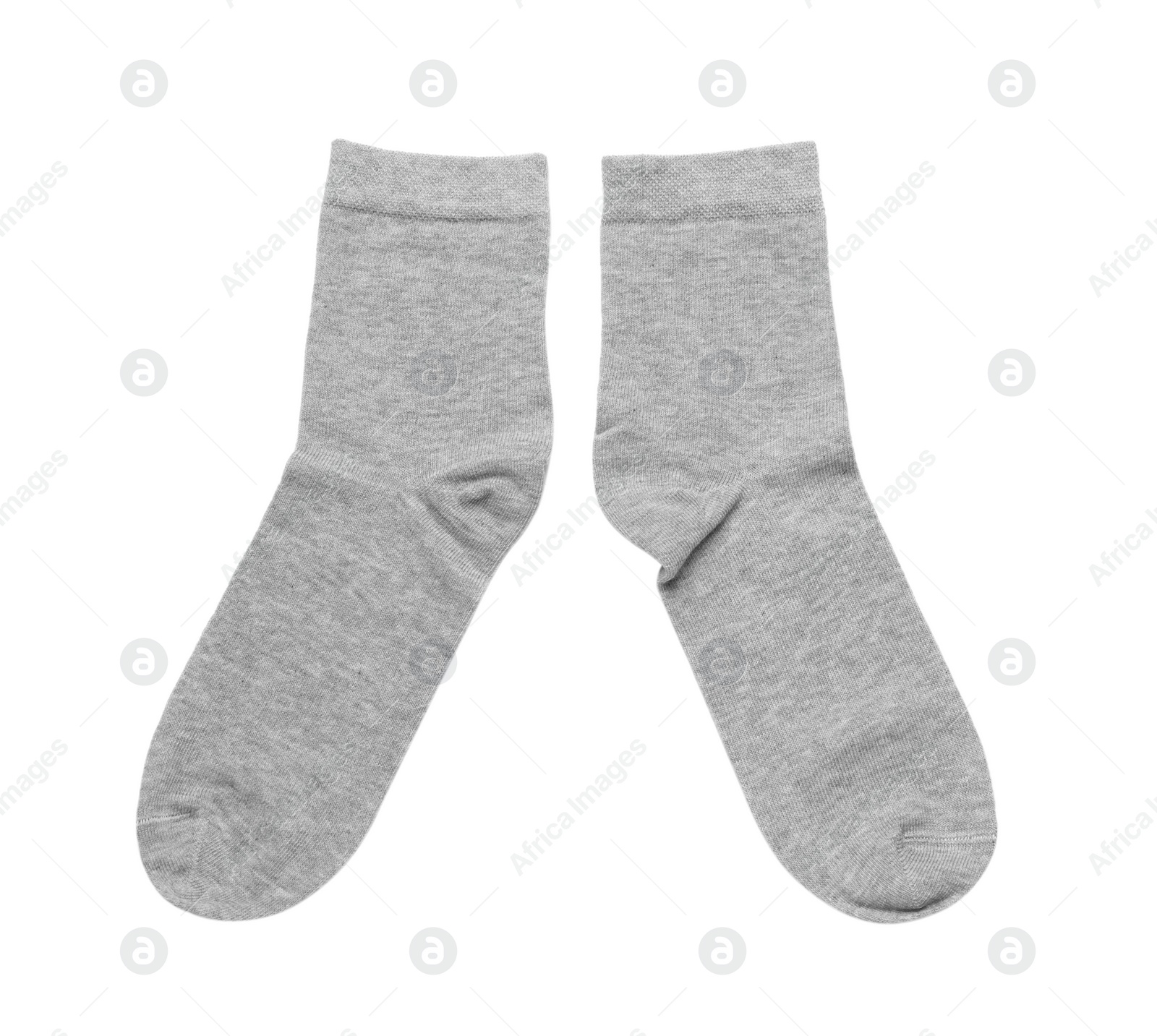 Photo of Pair of light grey socks isolated on white, top view