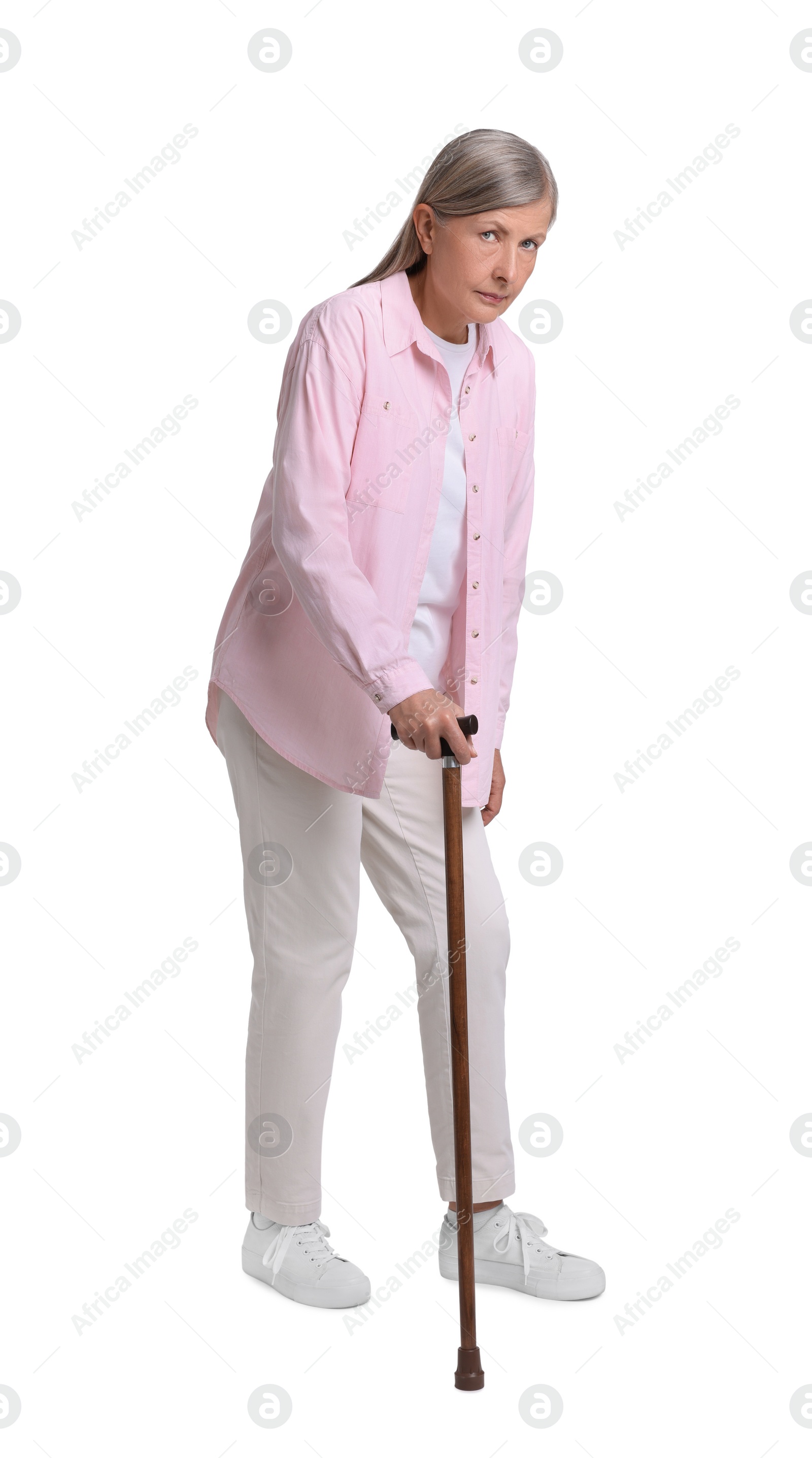 Photo of Senior woman with walking cane on white background