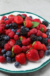 Different fresh ripe berries on table, closeup