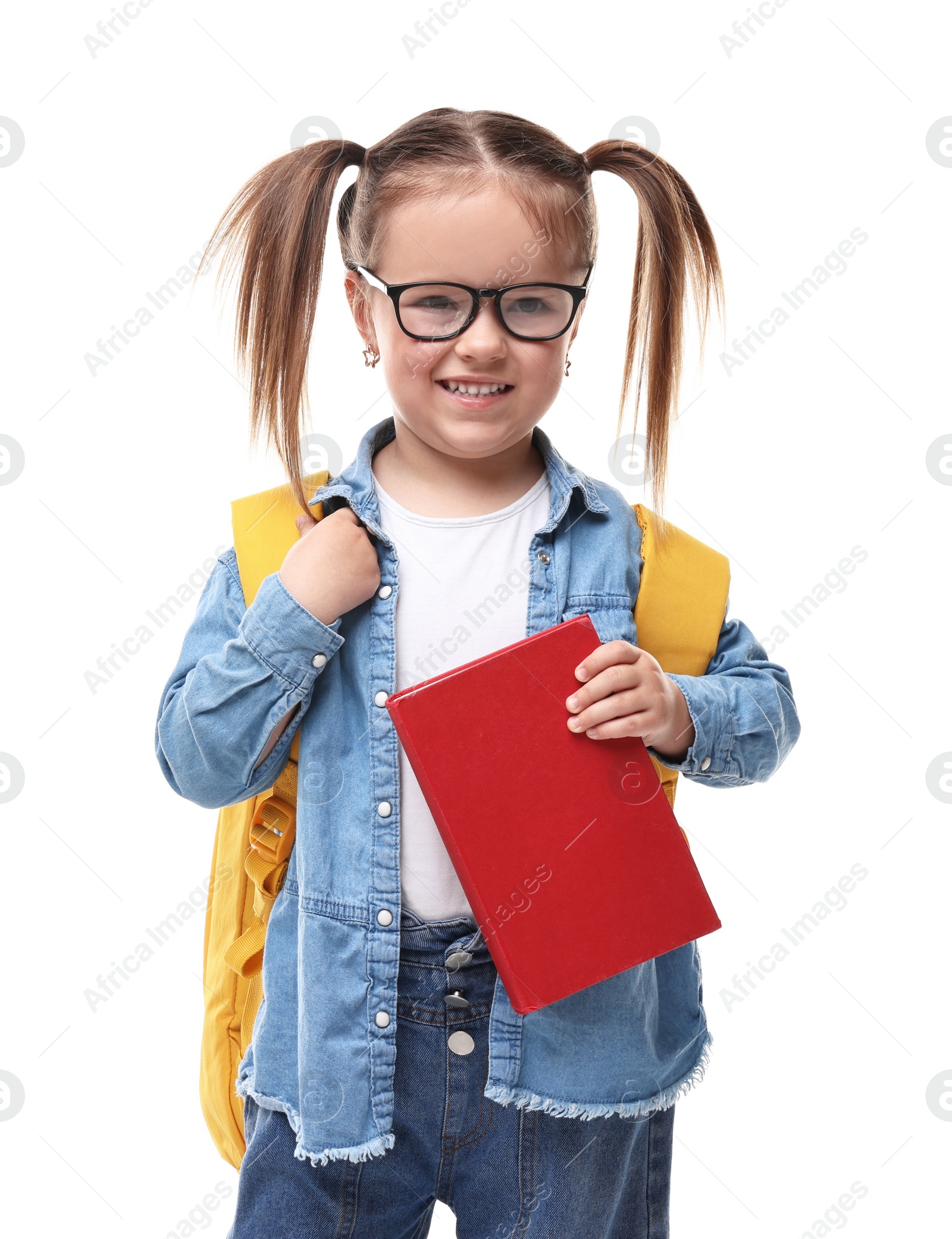 Photo of Cute little girl in glasses with book and backpack on white background