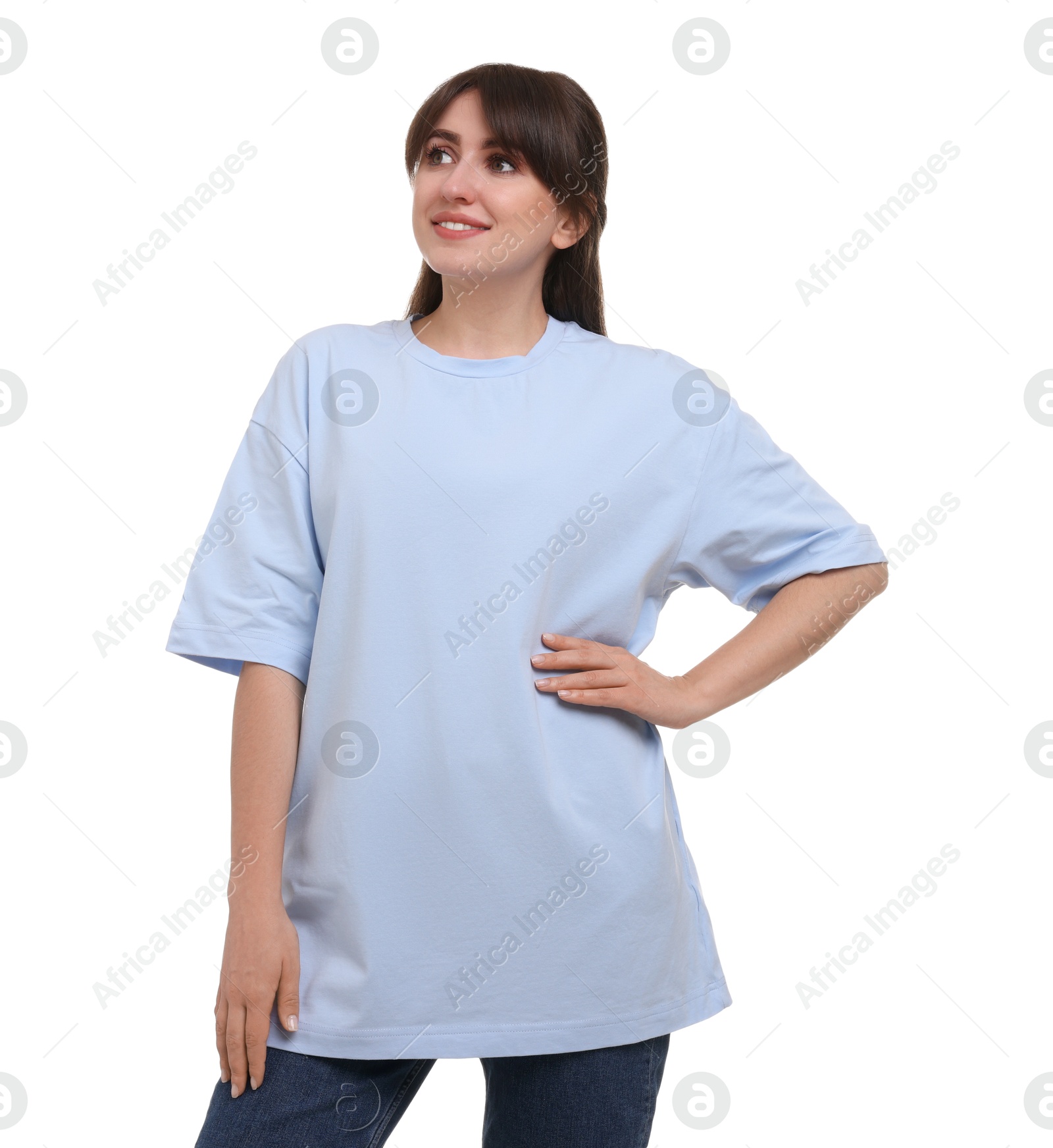 Photo of Smiling woman in stylish light blue t-shirt on white background