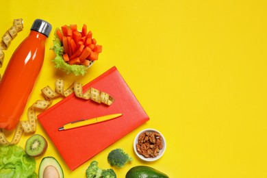 Photo of Weight loss concept. Flat lay composition with notebook, thermo bottle, measuring tape and different products on yellow background, space for text