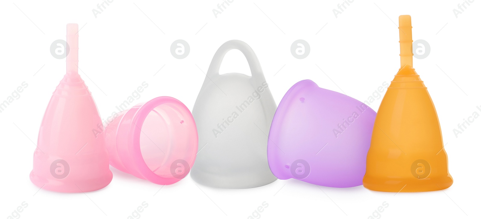 Image of Set with different menstrual cups on white background. Banner design