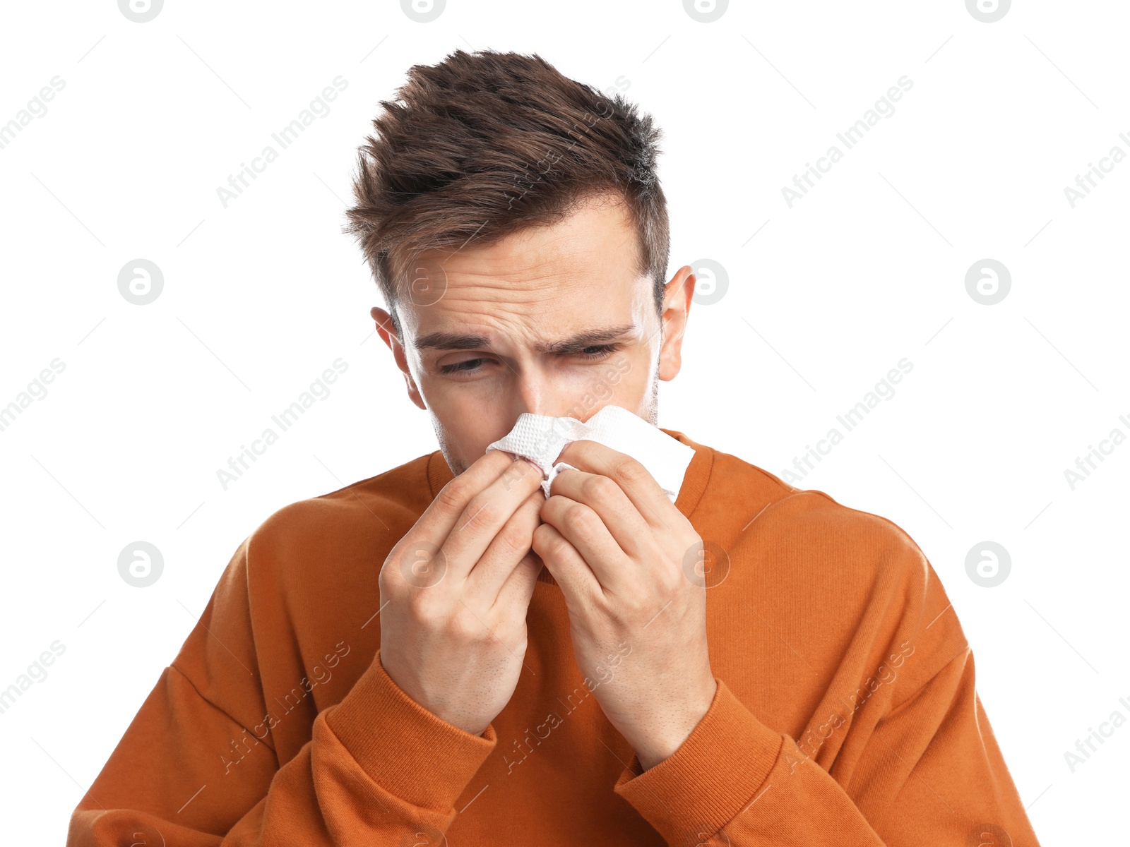 Photo of Young man suffering from cold on white background