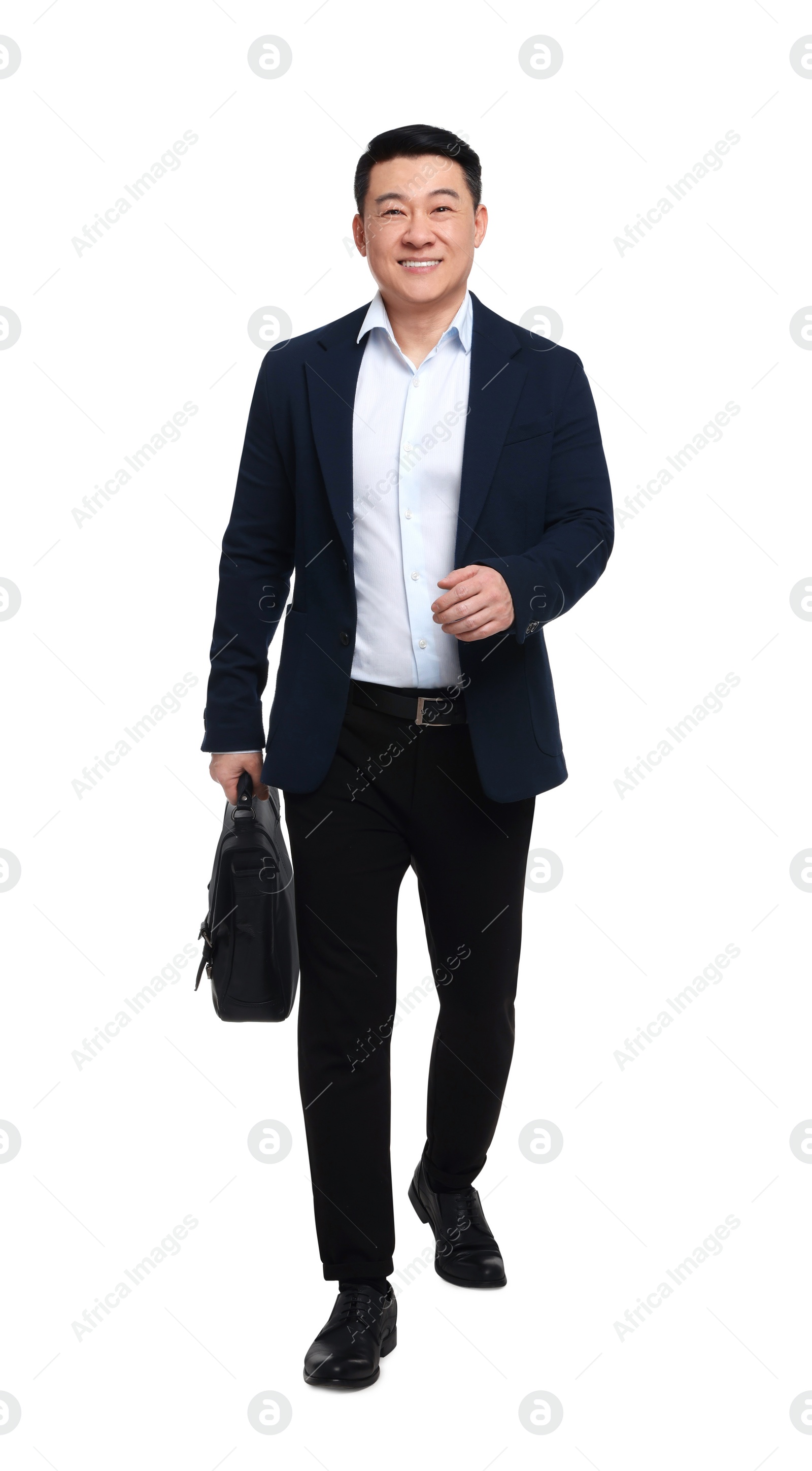 Photo of Businessman in suit with briefcase walking on white background