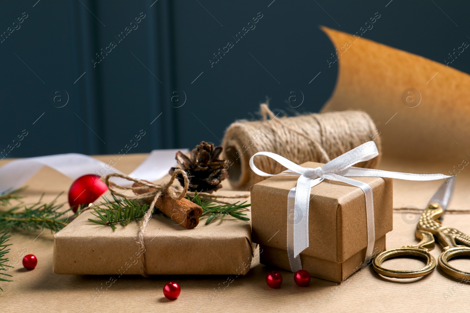 Photo of Beautiful gift boxes and decorations on wrapping paper. Christmas present