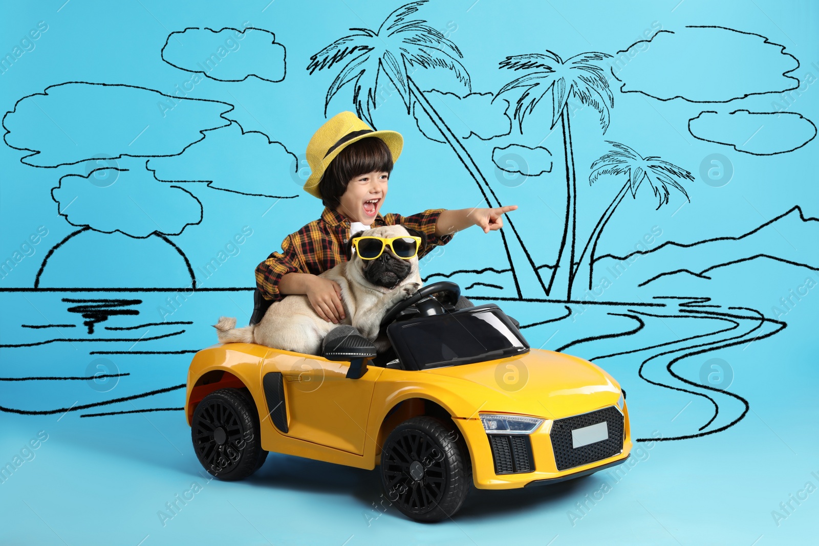 Image of Cute little boy with his dog in toy car and drawing of tropical resort on light blue background