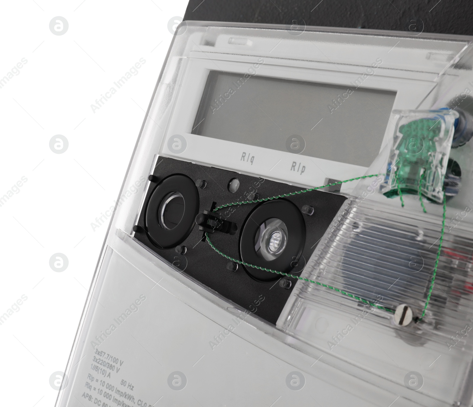 Photo of Electricity meter on grey wall against white background, closeup. Space for text