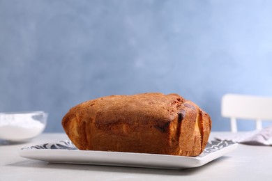 Fresh delicious cake served on light table