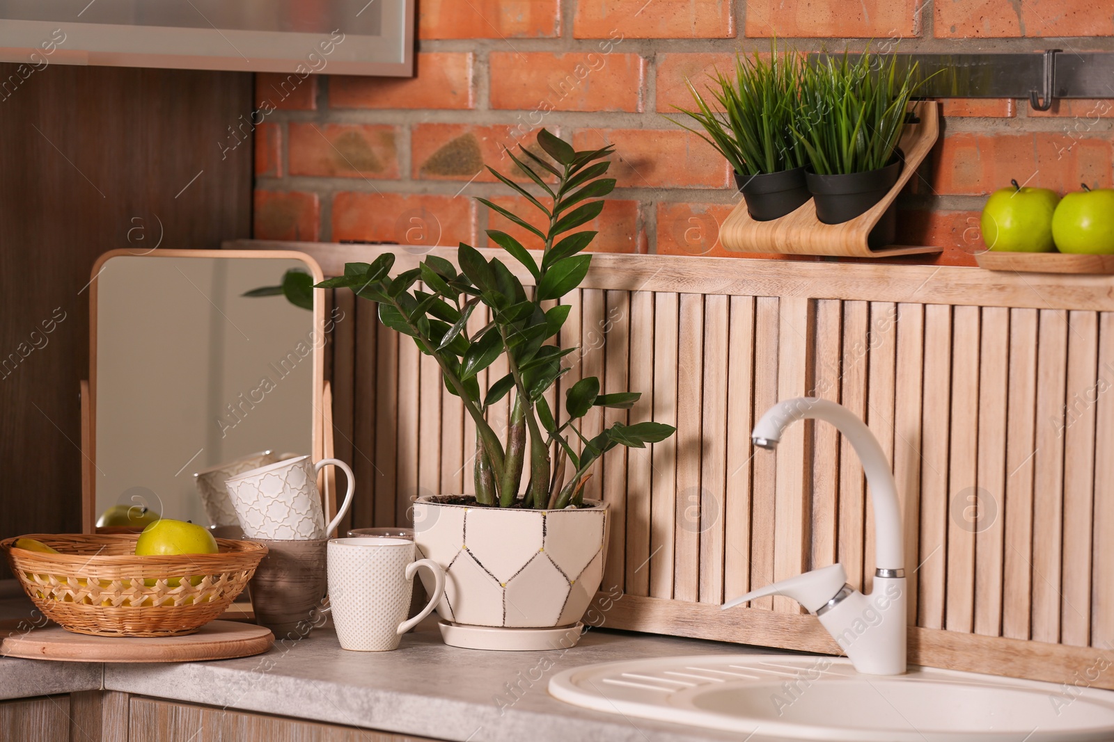 Photo of Stylish sink and faucet in modern kitchen. Idea for home design