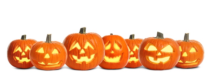 Image of Set of carved Halloween pumpkins on white background. Banner design