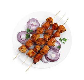 Photo of Delicious shish kebabs, onion and parsley isolated on white, top view