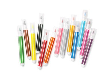 Photo of Many bright markers isolated on white, top view