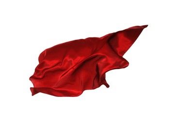 Photo of Beautiful delicate red silk floating on white background