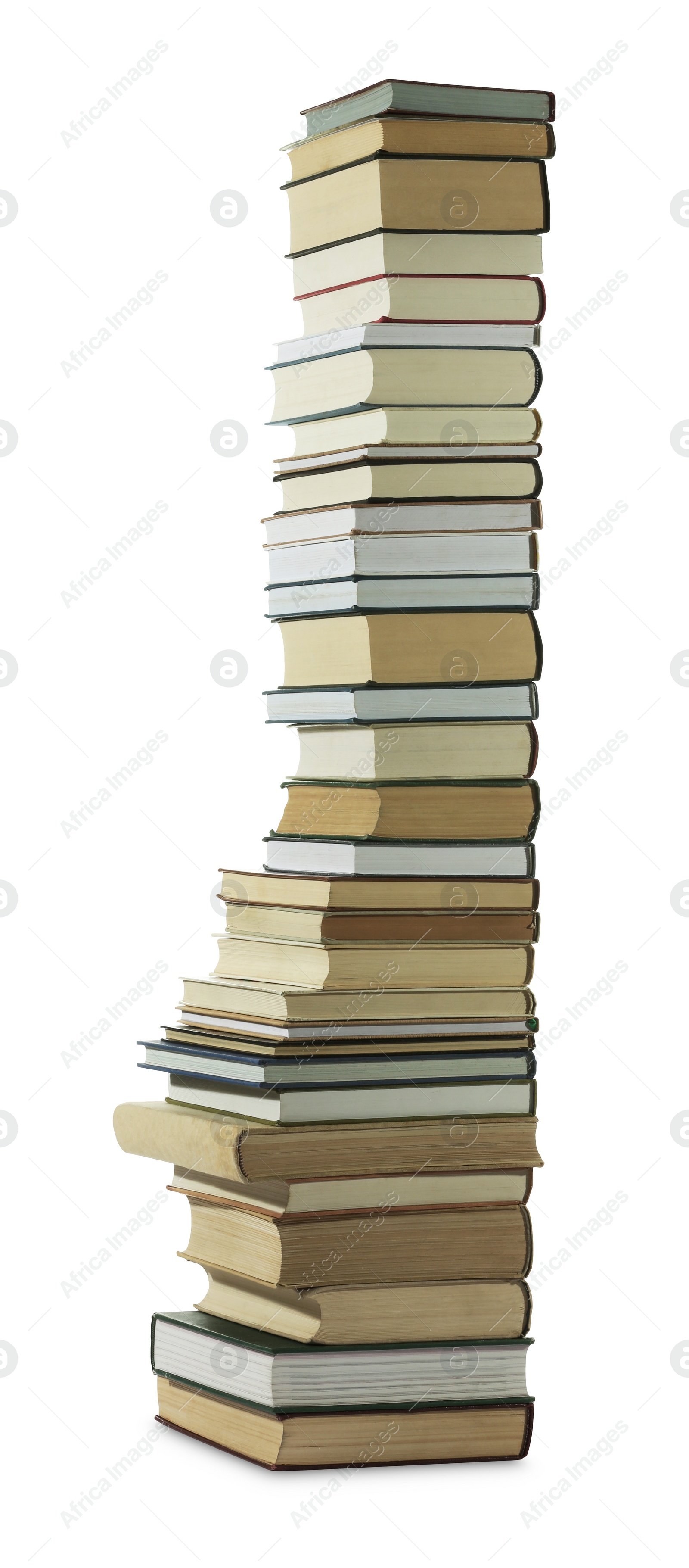 Photo of High stack of many different books isolated on white