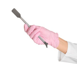 Photo of Doctor in sterile glove holding medical instrument on white background