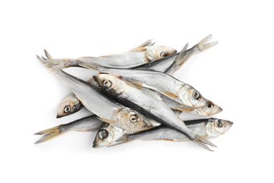 Photo of Tasty dried fish isolated on white, top view. Seafood