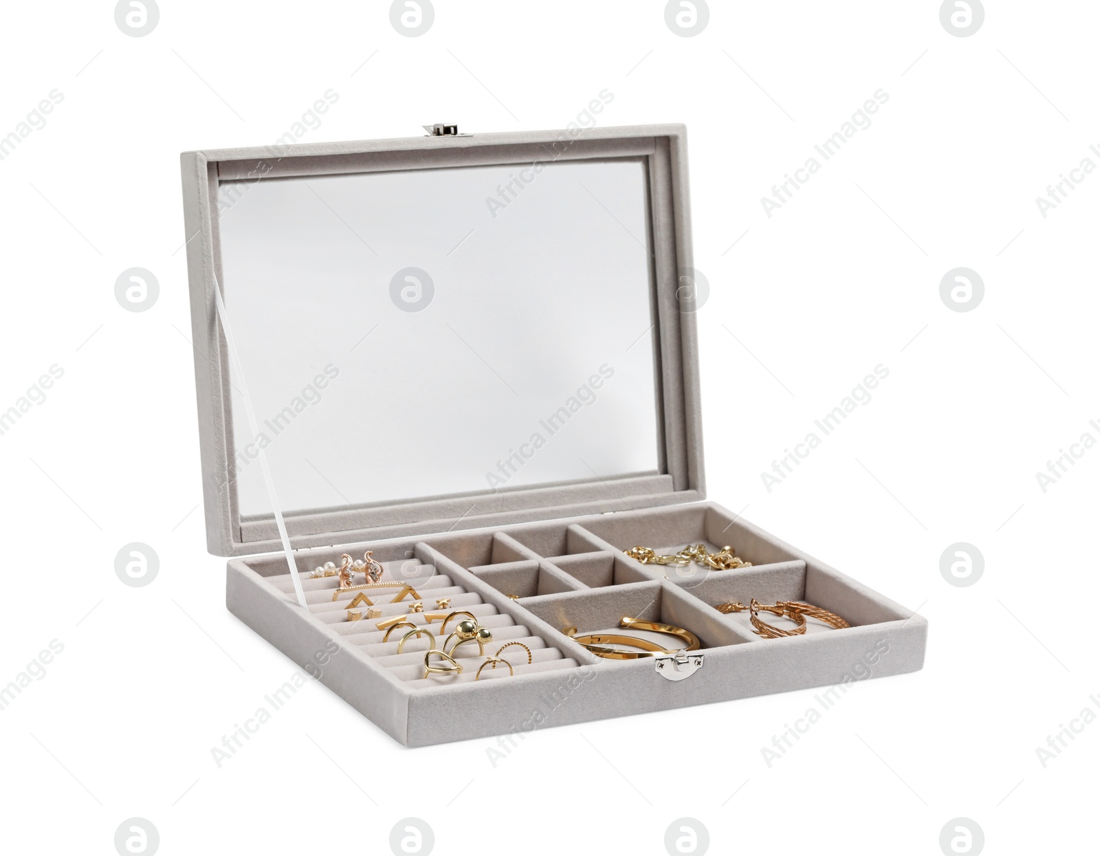 Photo of Jewelry box with many different golden accessories isolated on white