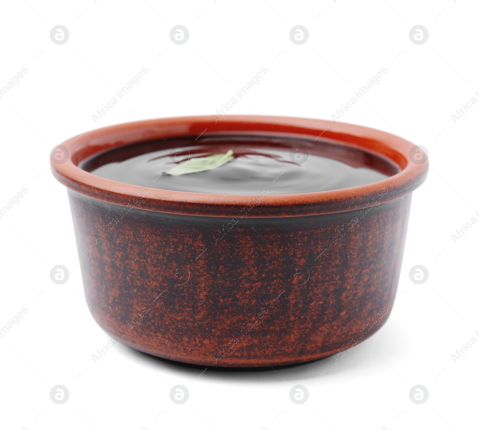 Photo of Bowl with balsamic glaze isolated on white