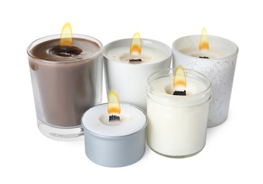 Aromatic candles with wooden wicks on white background