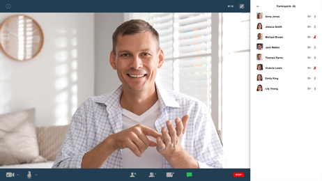 Man communicating with coworkers from home using video chat, view through camera