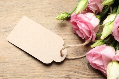 Happy Mother's Day. Beautiful flowers and blank card on wooden table