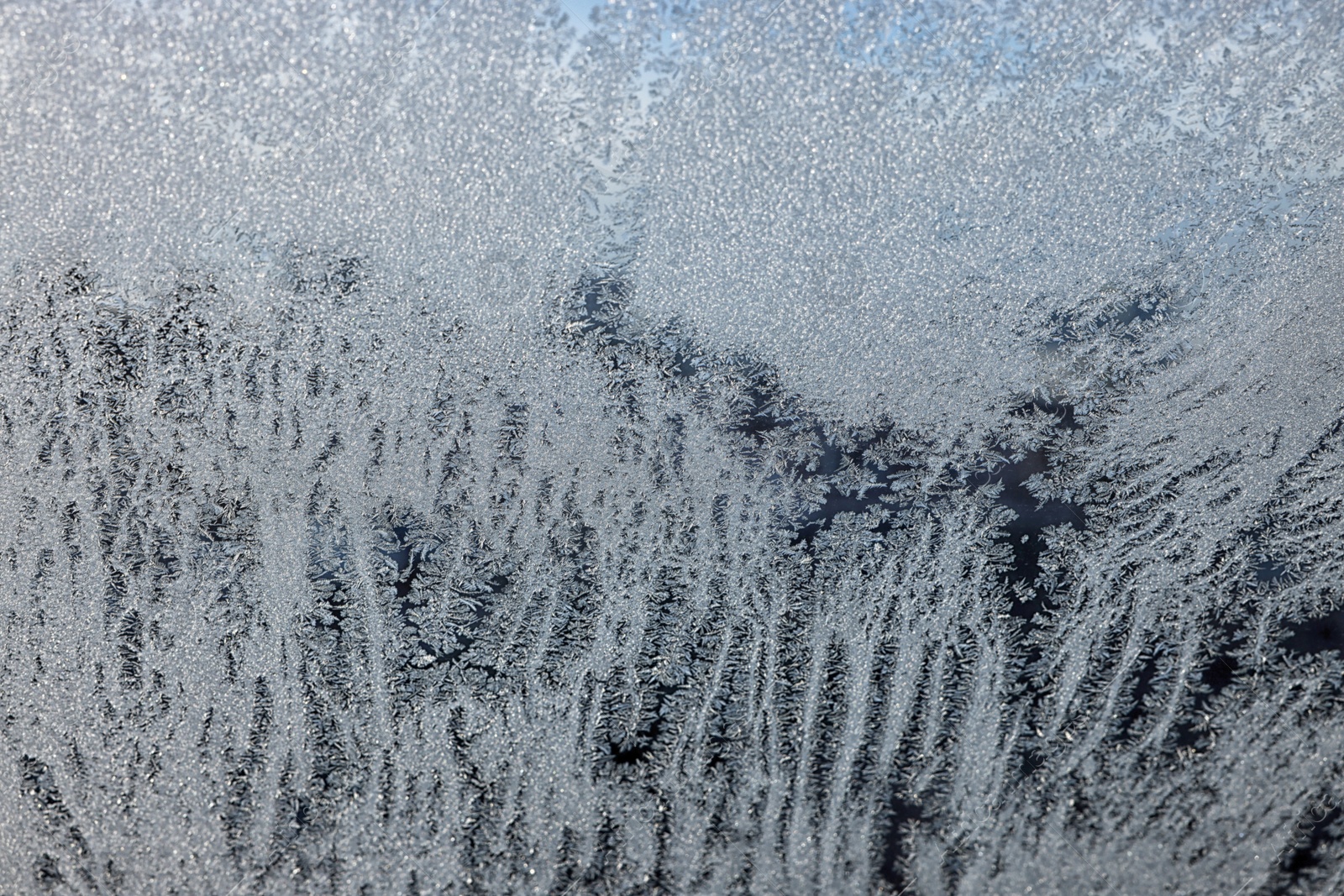 Photo of Beautiful frosty window as background, closeup. Winter morning