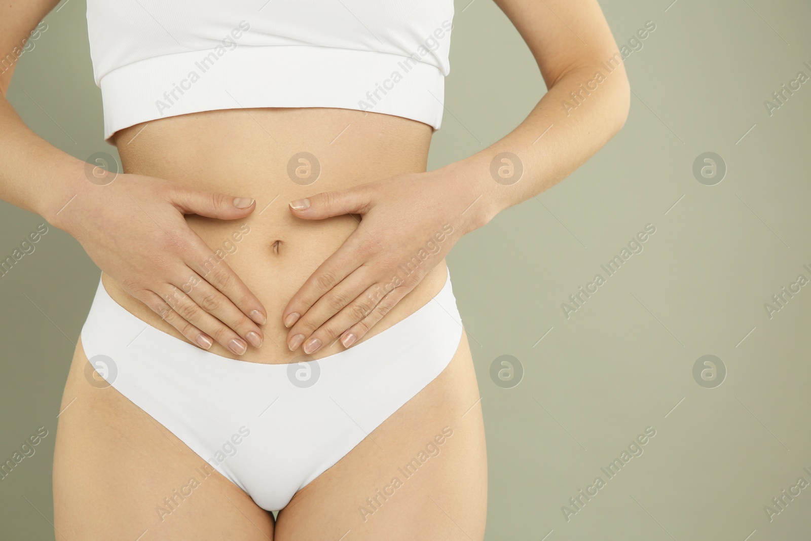 Photo of Gynecology. Woman in underwear on grey background, closeup. Space for text