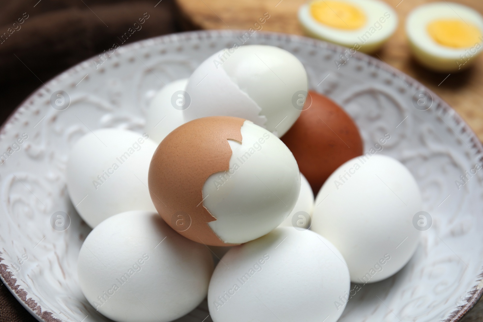 Photo of Many boiled eggs on plate, closeup view
