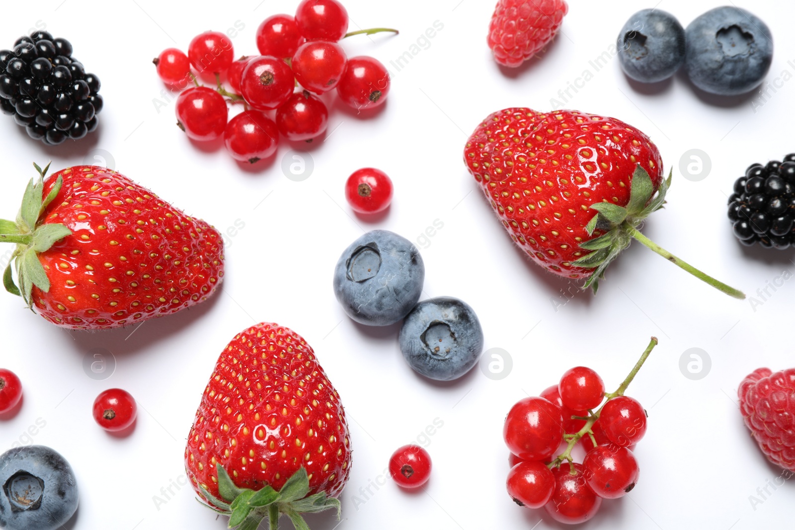 Photo of Mix of fresh berries on white background, flat lay