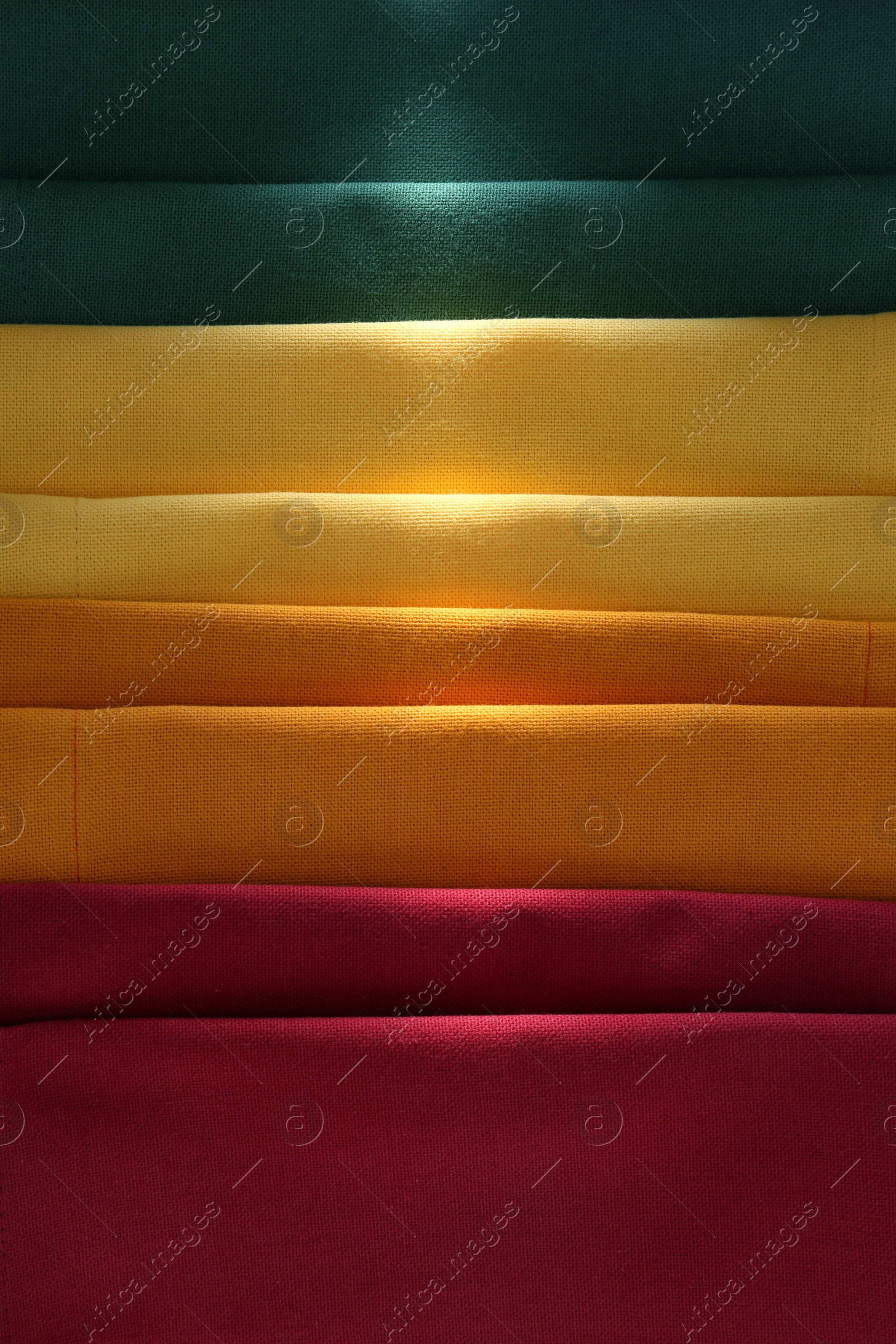 Photo of Different colorful napkins as background, top view