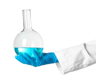 Photo of Scientist holding glass flask with liquid on white background. Chemical research