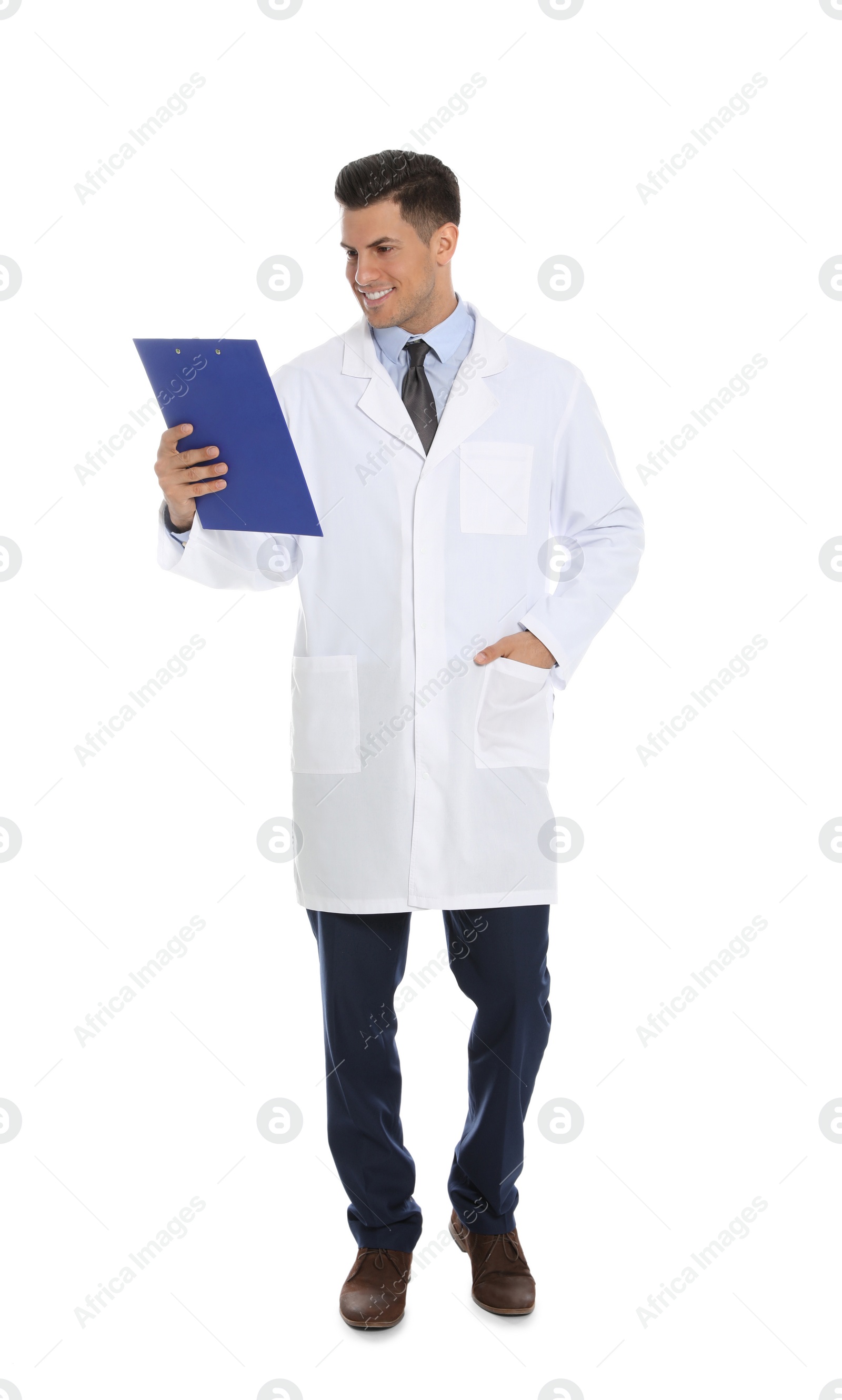 Photo of Full length portrait of medical doctor with clipboard isolated on white