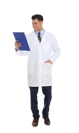 Full length portrait of medical doctor with clipboard isolated on white