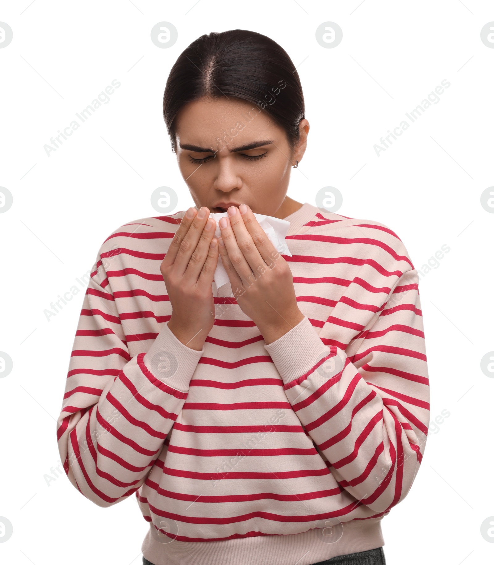 Photo of Woman with tissue coughing on white background. Cold symptoms