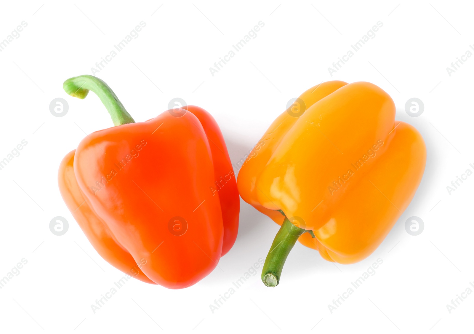Photo of Ripe colorful bell peppers isolated on white, top view