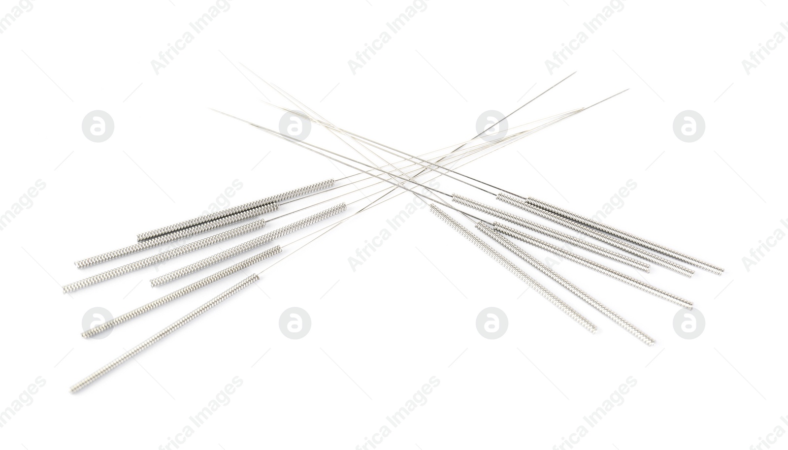 Photo of Many needles for acupuncture on white background