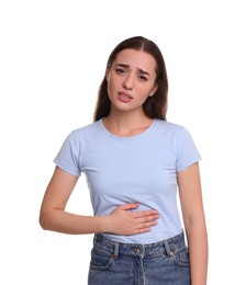 Woman suffering from abdominal pain on white background. Unhealthy stomach
