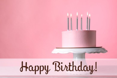 Image of Happy Birthday! Delicious cake with burning candles on pink background