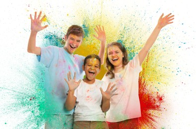 Image of Holi festival celebration. Happy friends covered with colorful powder dyes on white background