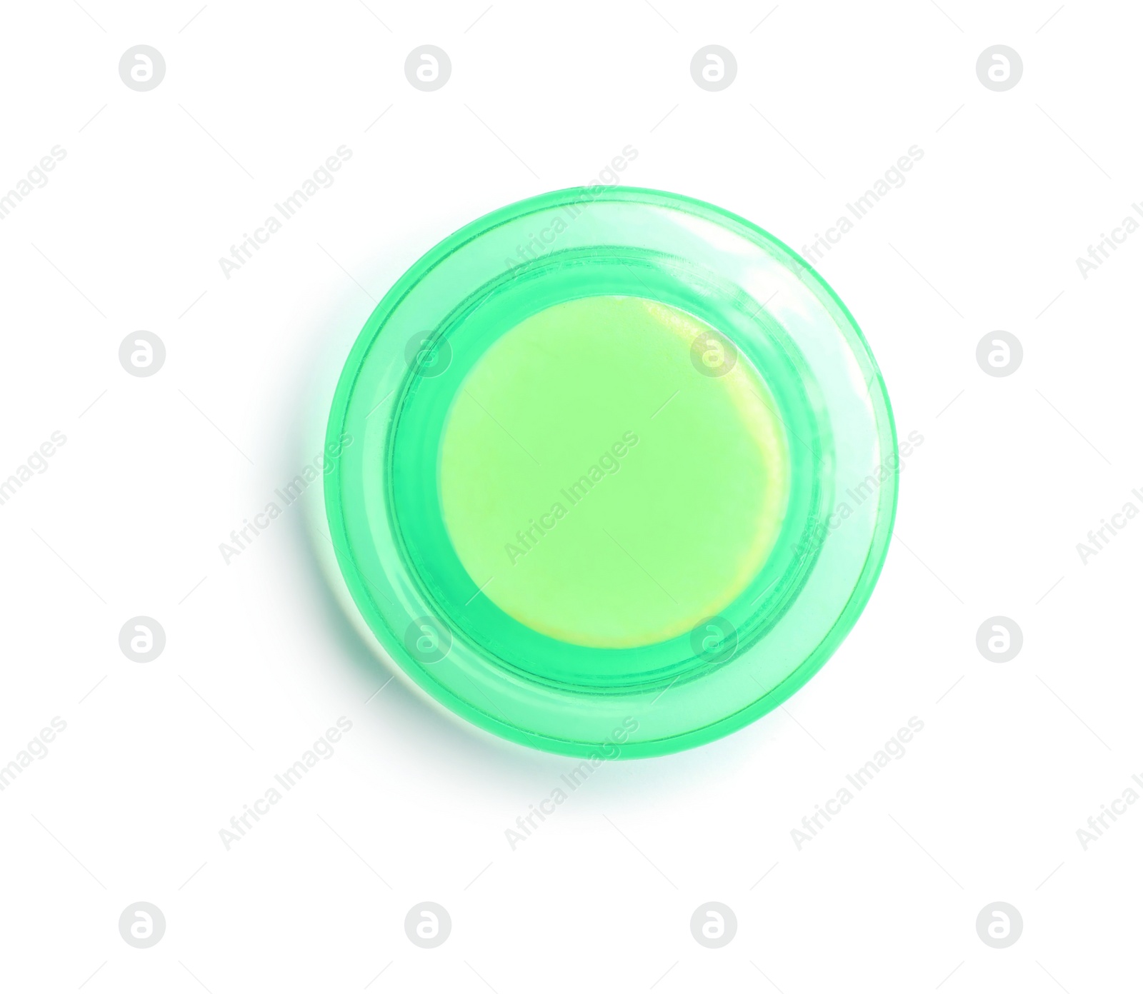 Photo of Bright green plastic magnet on white background, top view