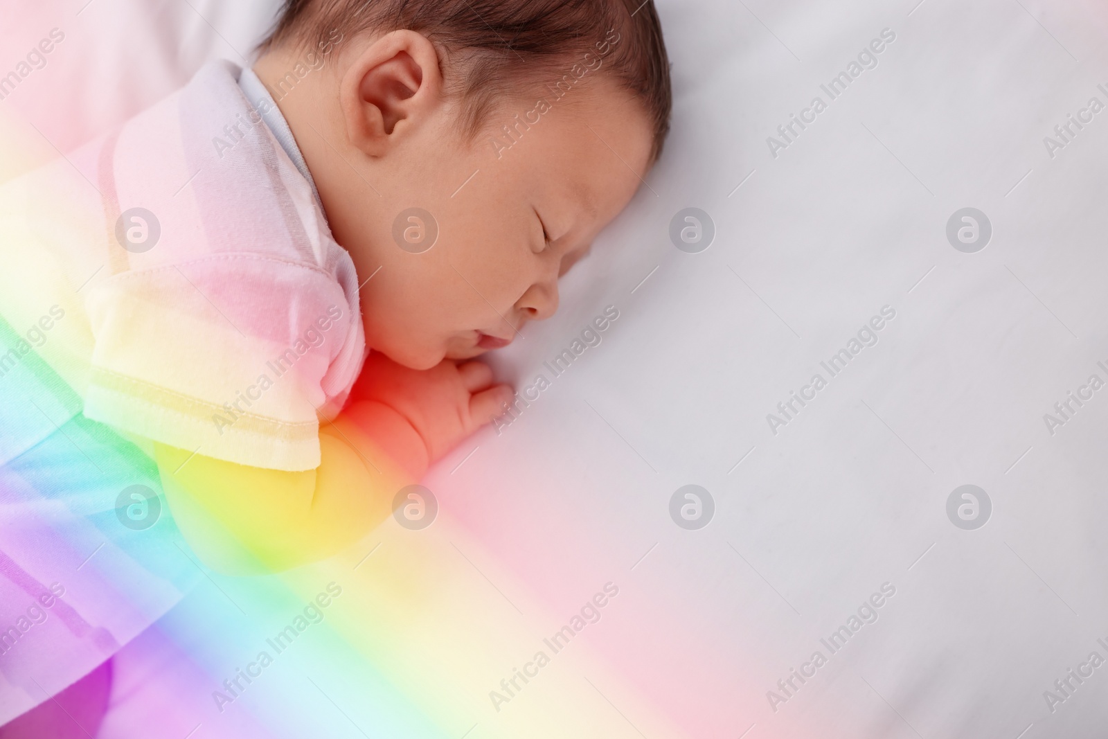 Image of National rainbow baby day. Cute child sleeping